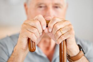 Man with illness walking in therapy